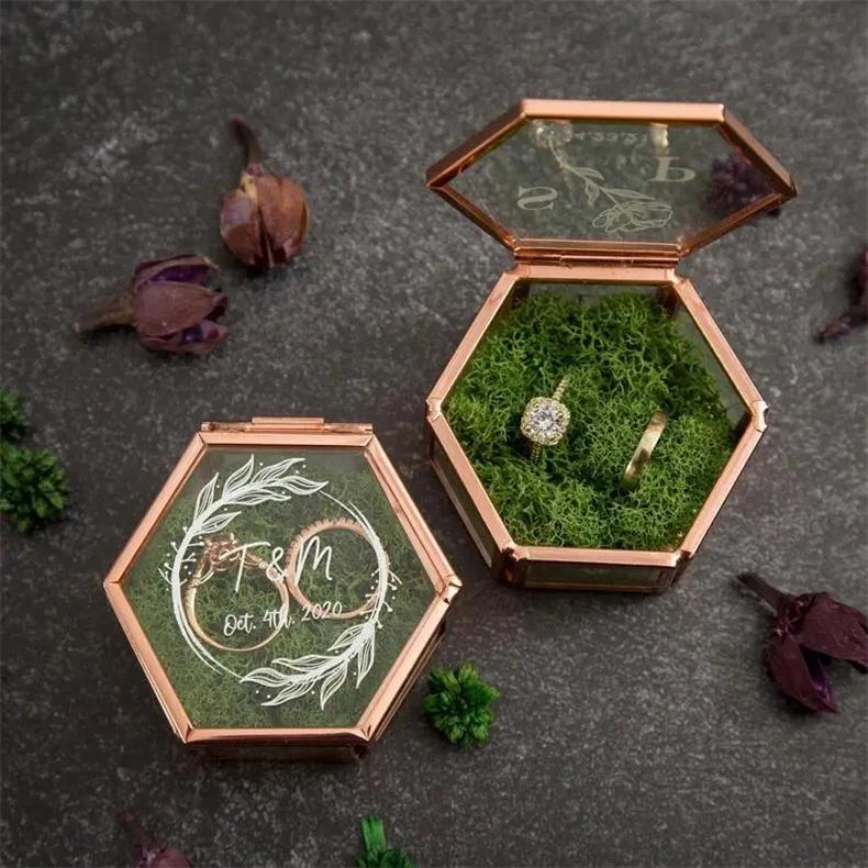 Hexagonal clamshell glass couples wedding ring box